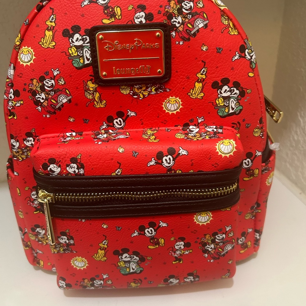 Loungefly Disney Parks runaway Red Backpack